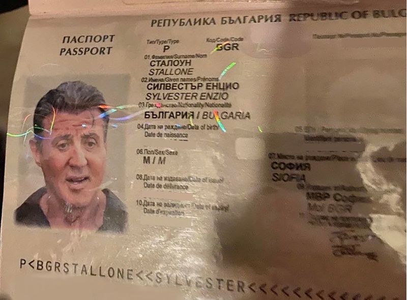 Handout image shows a counterfeit Bulgarian passport bearing a picture