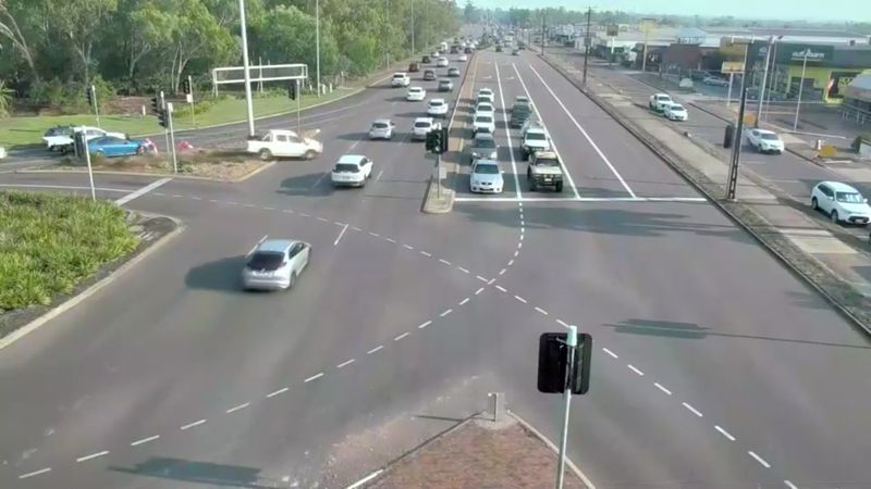 Toyota Hilux speeds across lanes of traffic in Darwin