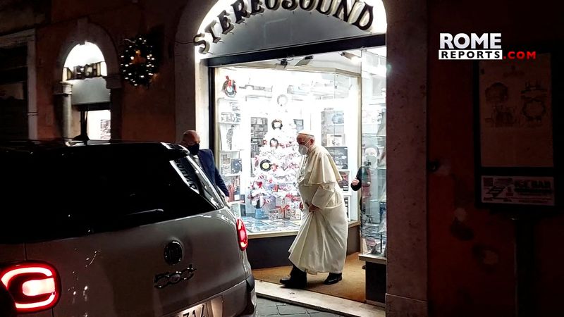 Pope makes surprise visit to a record store in Rome