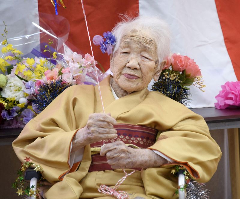 FILE PHOTO: Kane Tanaka, born in 1903, smiles as a