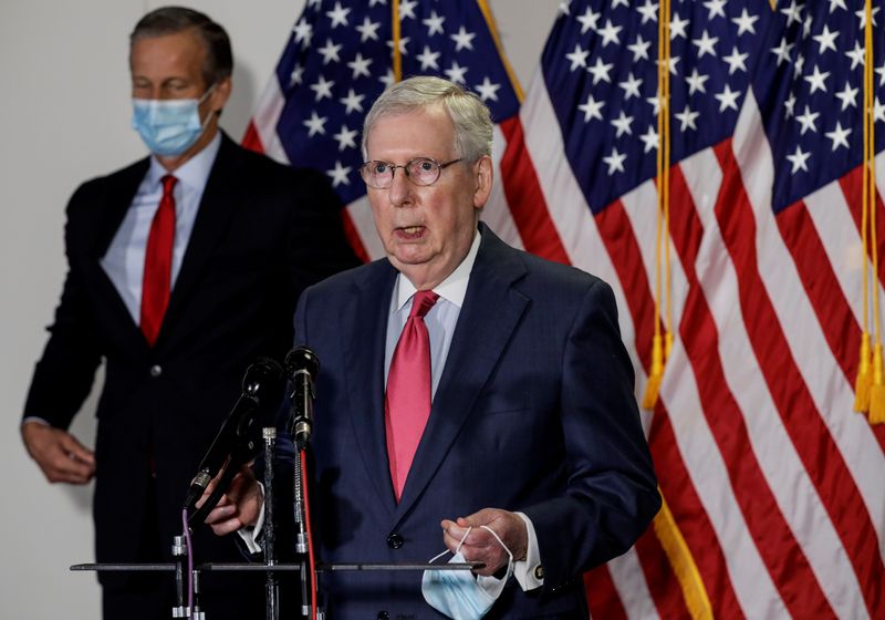 U.S. Senate Majority Leader Mitch McConnell speaks to reporters about