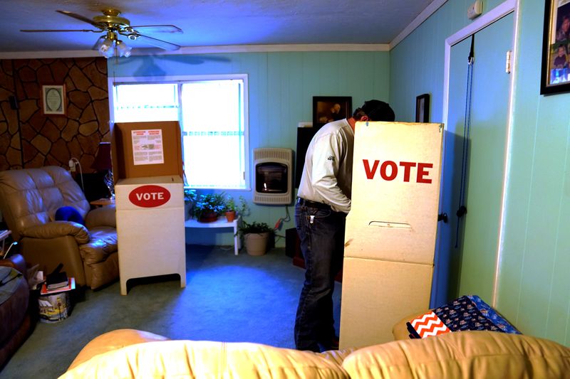 FILE PHOTO: A voter fills out his ballot in Margaret