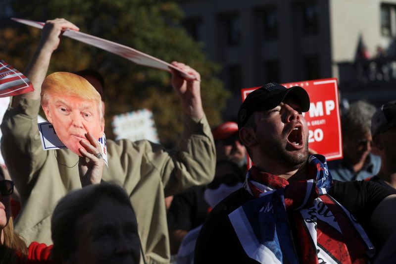 Supporters of U.S. President Donald Trump rally outside the State