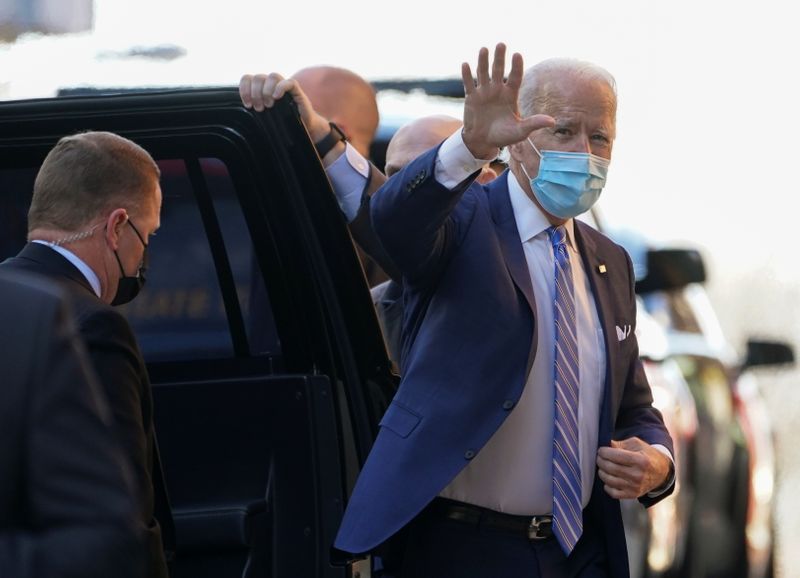 U.S. president-elect Joe Biden arrives at the Queen theatre for