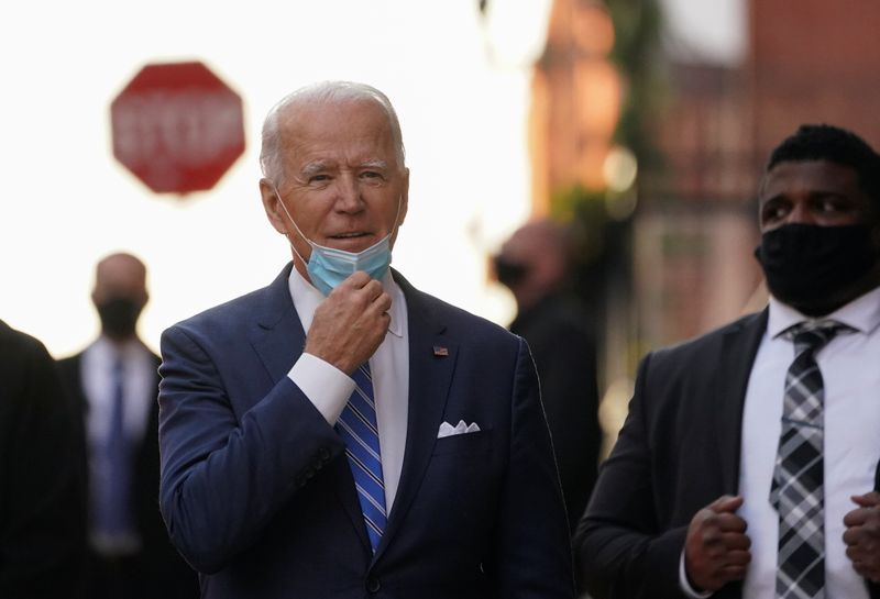 U.S. president-elect Joe Biden departs the Queen theatre for meeting