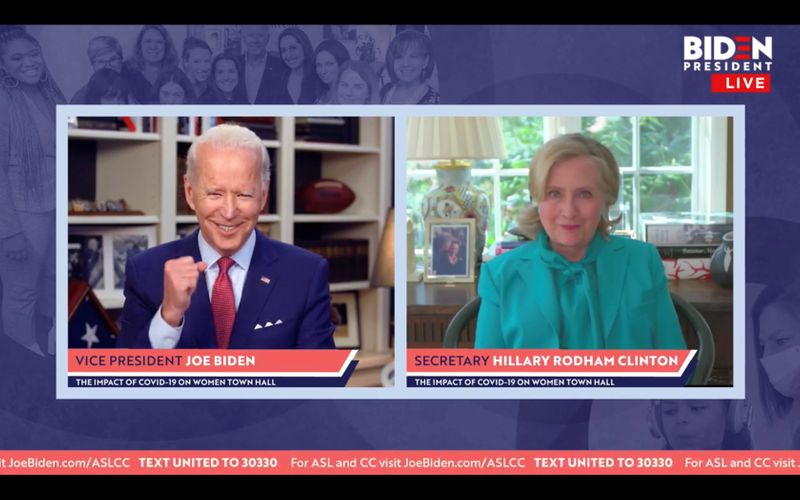 Democratic U.S. presidential candidate Joe Biden reacts as Hillary Clinton
