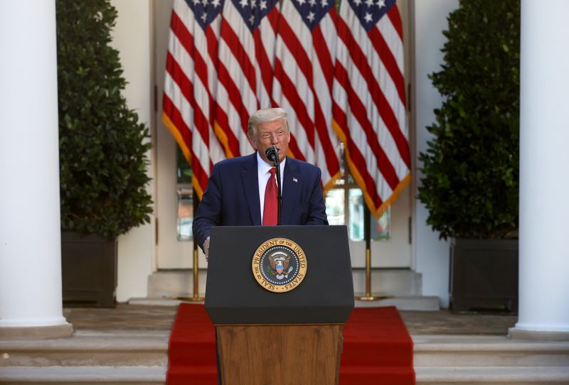 U.S. President Donald Trump attends a news conference in the