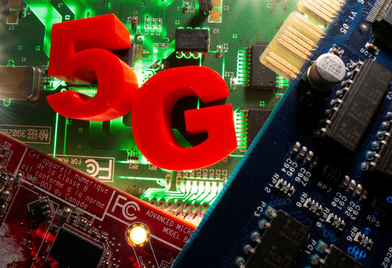 3d printed objects representing 5G are put on a motherboard