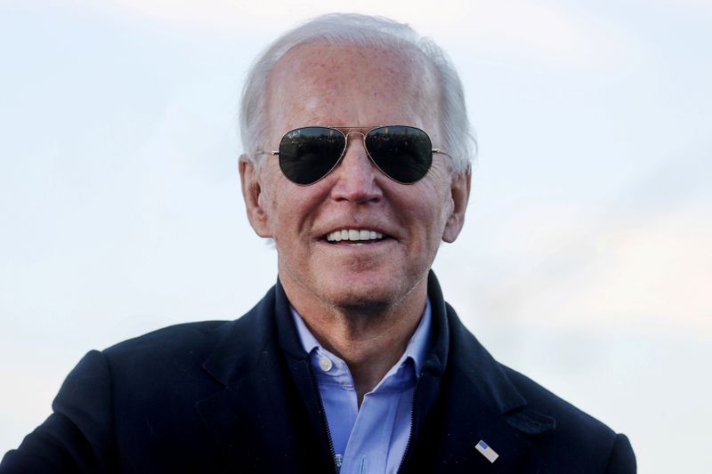 FILE PHOTO: U.S. President-elect Biden campaigns for Democratic U.S. Senate