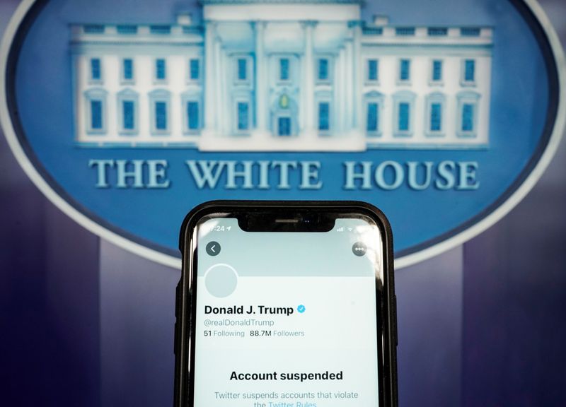 A photo illustration shows the suspended Twitter account of U.S.