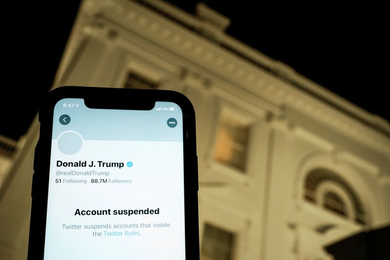 A photo illustration shows the suspended Twitter account of U.S.