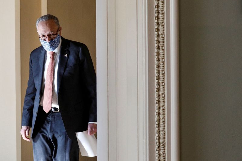 U.S. Senate Majority Leader Chuck Schumer walks on Capitol Hill