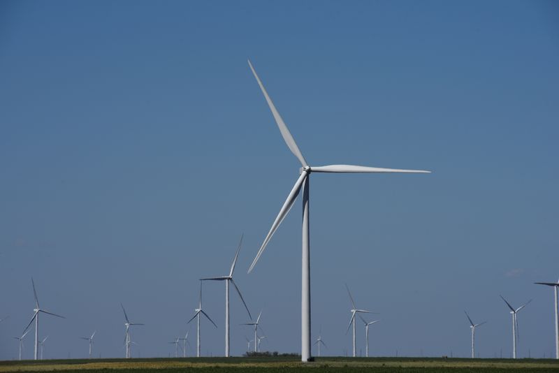 Wind turbines generate power on a farm near Throckmorton