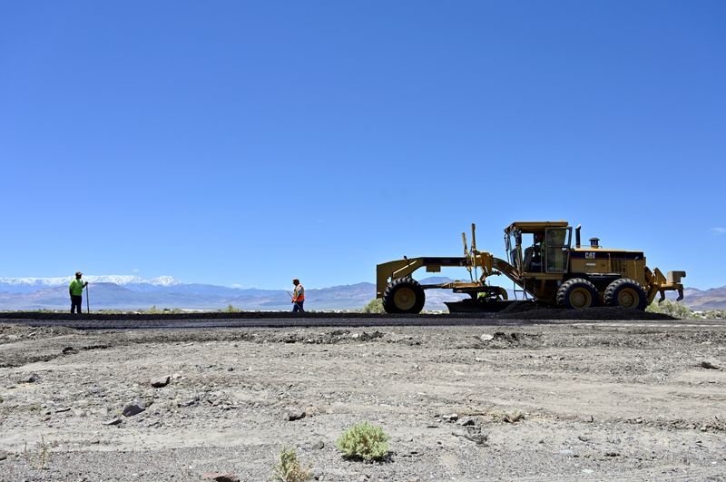 FILE PHOTO: Nevada Department of Transportation workers repair the roadway