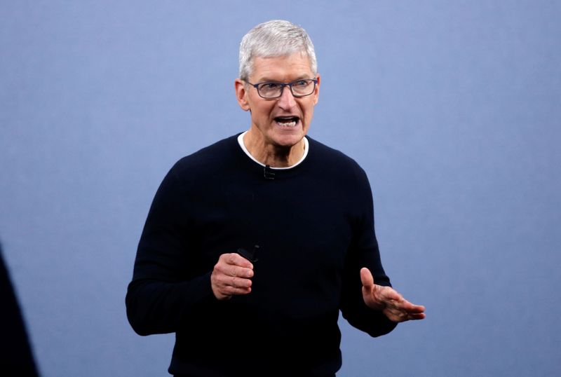 FILE PHOTO: CEO Tim Cook speaks at an Apple event