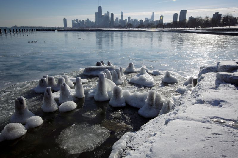 FILE PHOTO: Ice covers the shore of Lake Michigan in