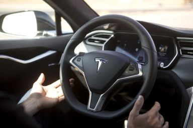 New Autopilot features are demonstrated in a Tesla Model S