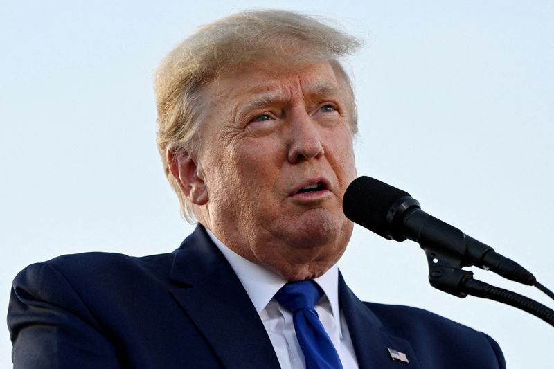 FILE PHOTO: Former U.S. President Donald Trump hosts a rally