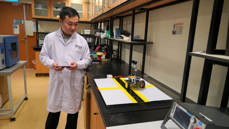 Dr. Swee Ching Tan uses a remote controlled vehicle to