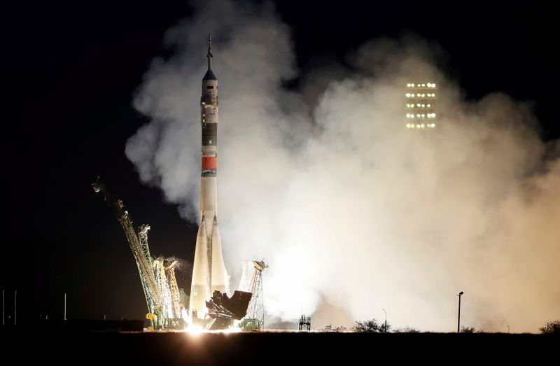 FILE PHOTO: A Soyuz MS-15 spacecraft carrying ISS crew blasts