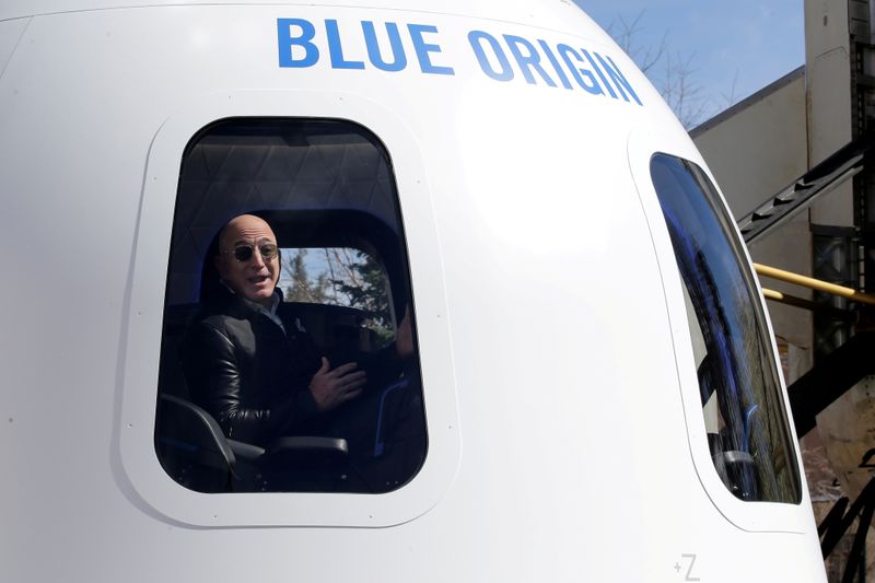 FILE PHOTO: Amazon and Blue Origin founder Jeff Bezos addresses