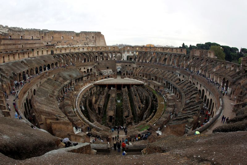 FILE PHOTO: People visit Rome’s ancient Colosseum