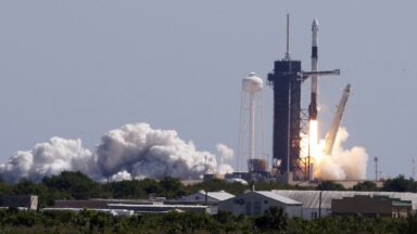A SpaceX Falcon 9 rocket, lifts off in the first