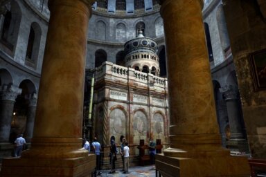 FILE PHOTO: People visit the Church of the Holy Sepulchre