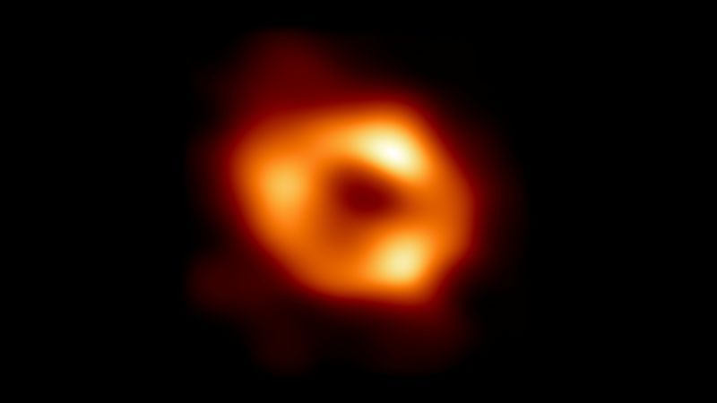 Scientists unveil an image of a huge black hole at