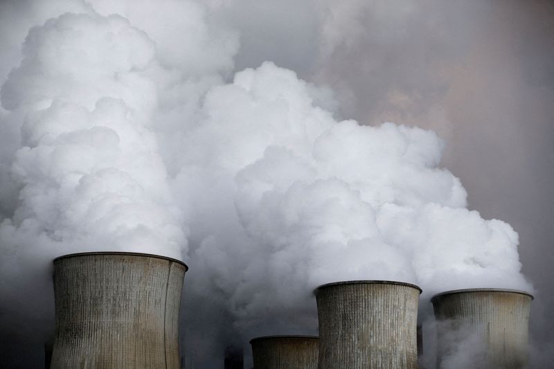 FILE PHOTO: Steam rises from the cooling towers of the
