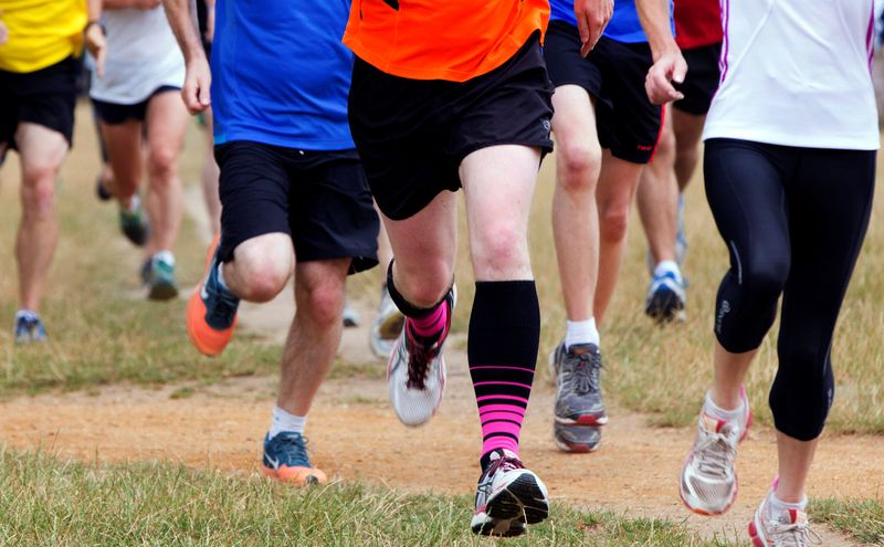 FILE PHOTO: Participants take part in a parkrun event at