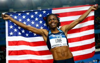Lowe of the U.S. celebrates her gold medal at women’s