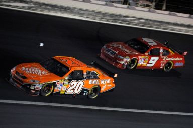 Stewart leads Kahne during the NASCAR Sprint Cup Coca-Cola 600