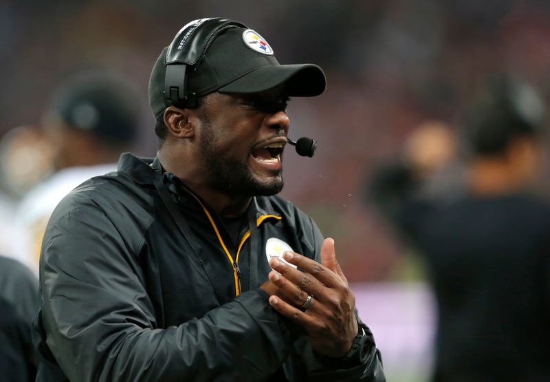Pittsburgh Steelers head coach Tomlin directs his team’s play in
