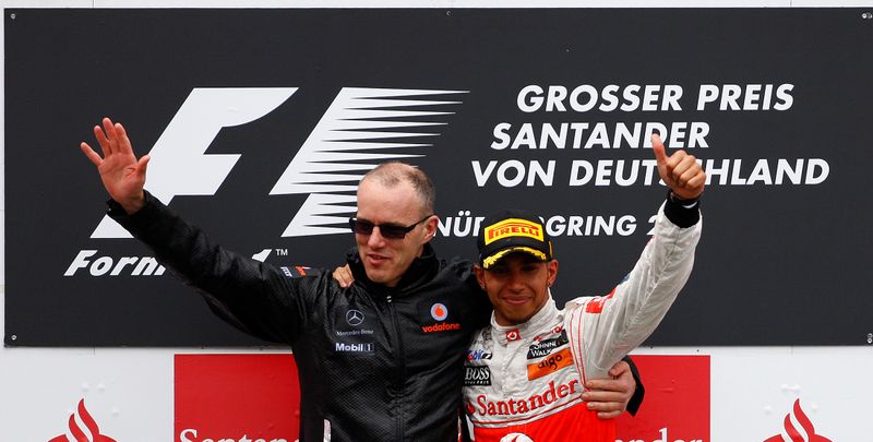 FILE PHOTO: McLaren Formula One driver Hamilton of Britain celebrates