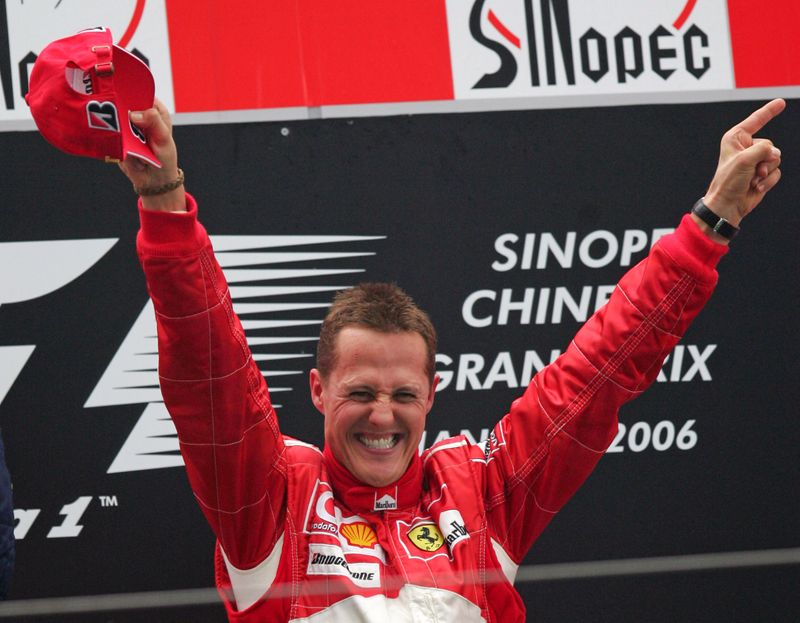 FILE PHOTO: Ferrari Formula One driver Schumacher celebrates after winning
