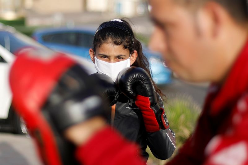 Gaza boxing girls train on the beach amid concerns about