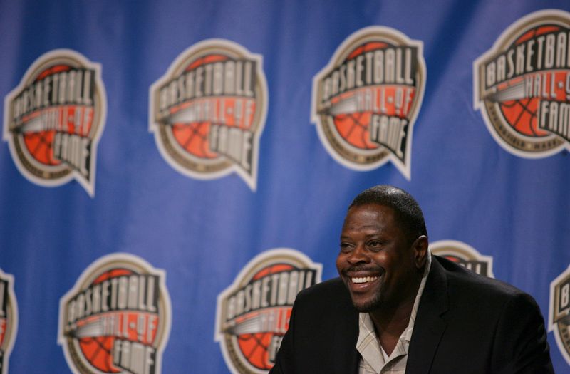 Former NBA player Ewing smiles during an induction news conference