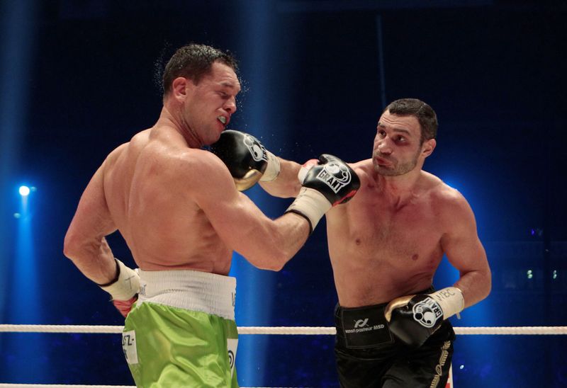 FILE PHOTO: Vitali Klitschko lands a punch on Polish fighter