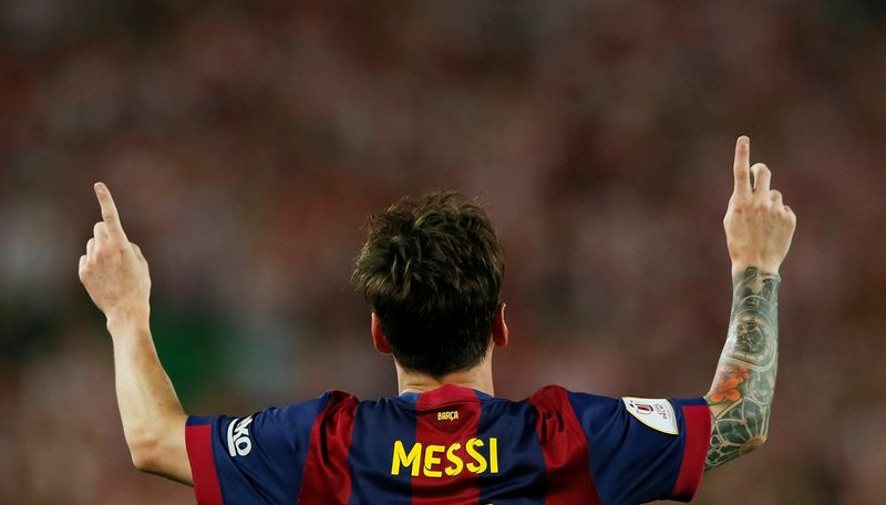 FILE PHOTO: Lionel Messi celebrates after scoring the first goal