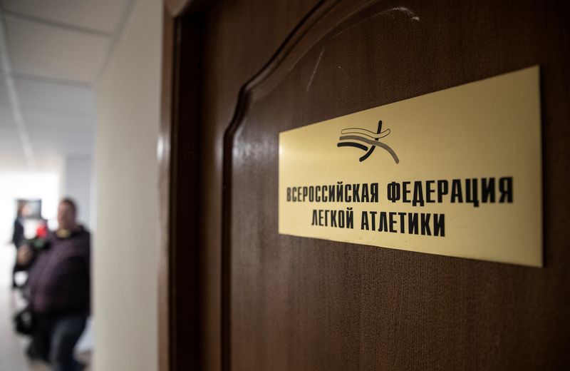 A sign on display saying “Russian Federation of Athletics” is