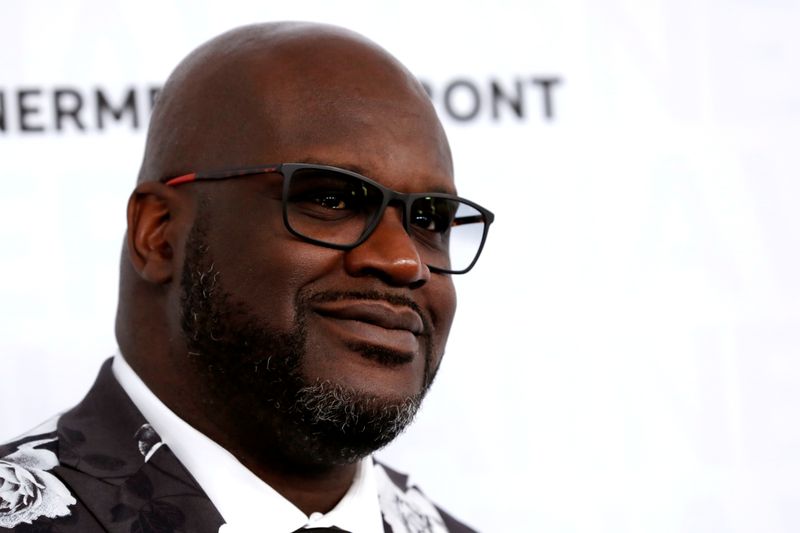 FILE PHOTO: Broadcaster and former NBA star Shaquille O’Neal poses