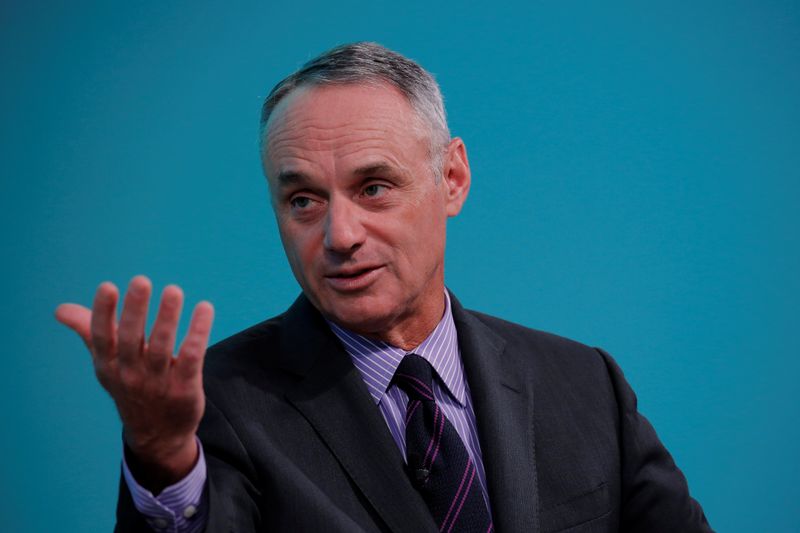 FILE PHOTO: Rob Manfred, commissioner of Major League Baseball, takes