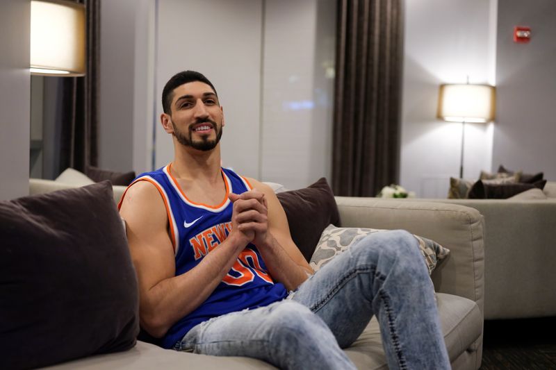 Turkish NBA player Enes Kanter watches the final minutes of