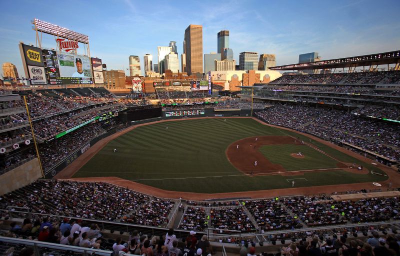 FILE PHOTO: Fans watch as the Minnesota Twins play the
