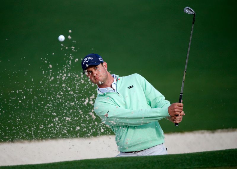 U.S. golfer Harris English hits from the sand on the