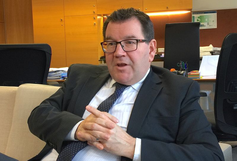 New Zealand’s Finance Minister Grant Robertson reacts during an interview