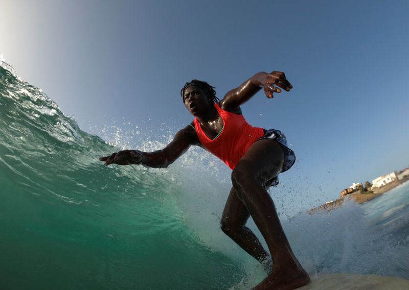 Wider Image: Meet Senegal’s first female pro surfer inspiring girls