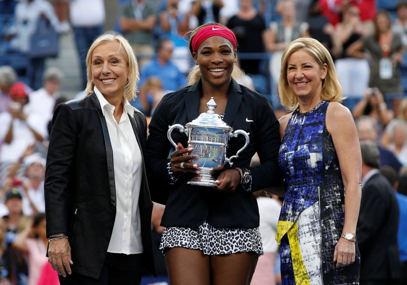 FILE PHOTO: Williams of the U.S. holds her trophy while