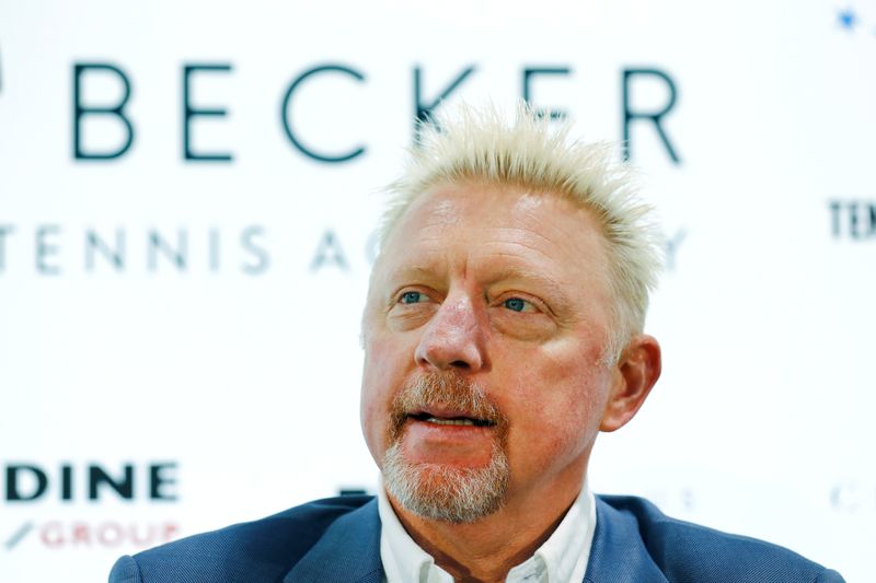 FILE PHOTO: Three-times Wimbledon champion Becker attends a news conference